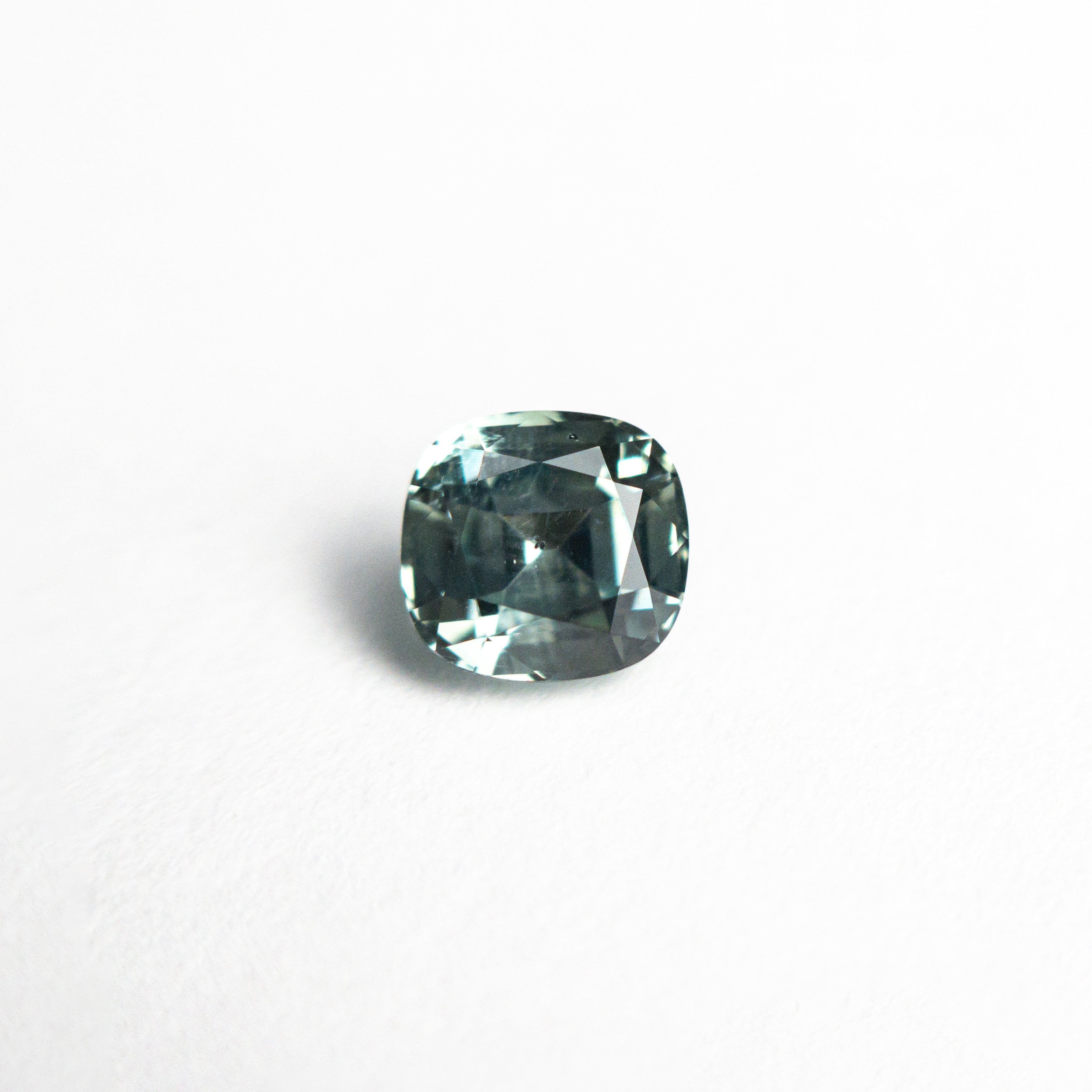 Teal/Green Brilliant Sapphire - 0.84ct Cushion