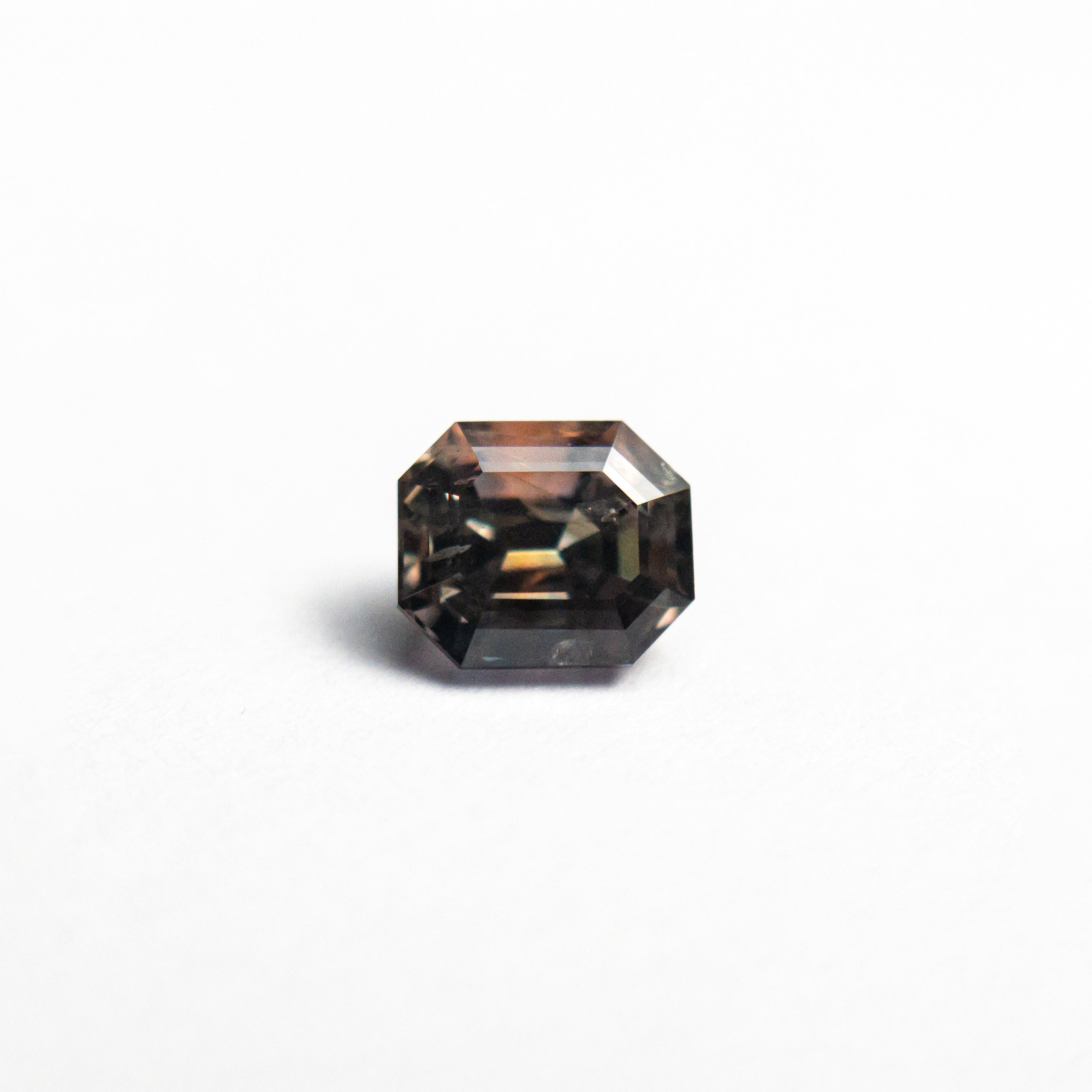 Red/Brown Step Cut Sapphire - 0.88ct Cut Corner Rectangle