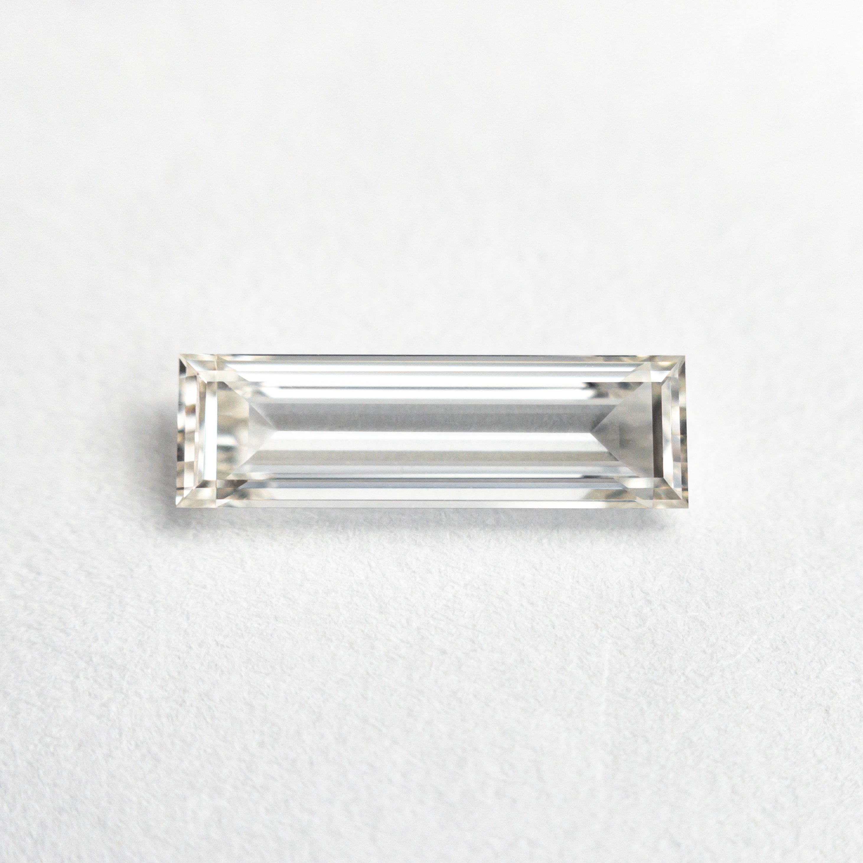 0.71ct 10.48x3.17x1.86mm GIA Internally Flawless I Baguette Step Cut 24302-01 - Foe & Dear