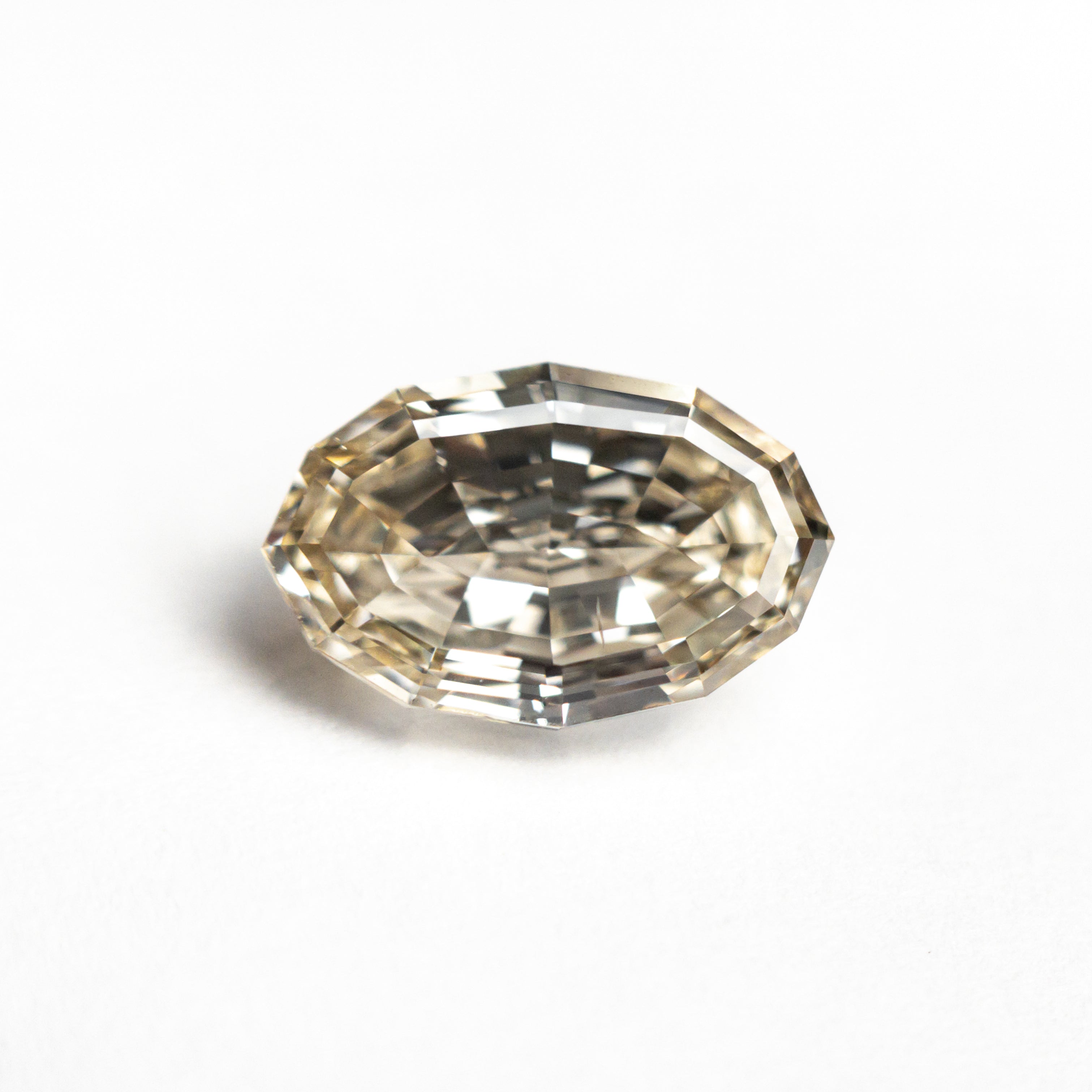 Light Champagne Step Cut Diamond - 1.91ct Geo Oval