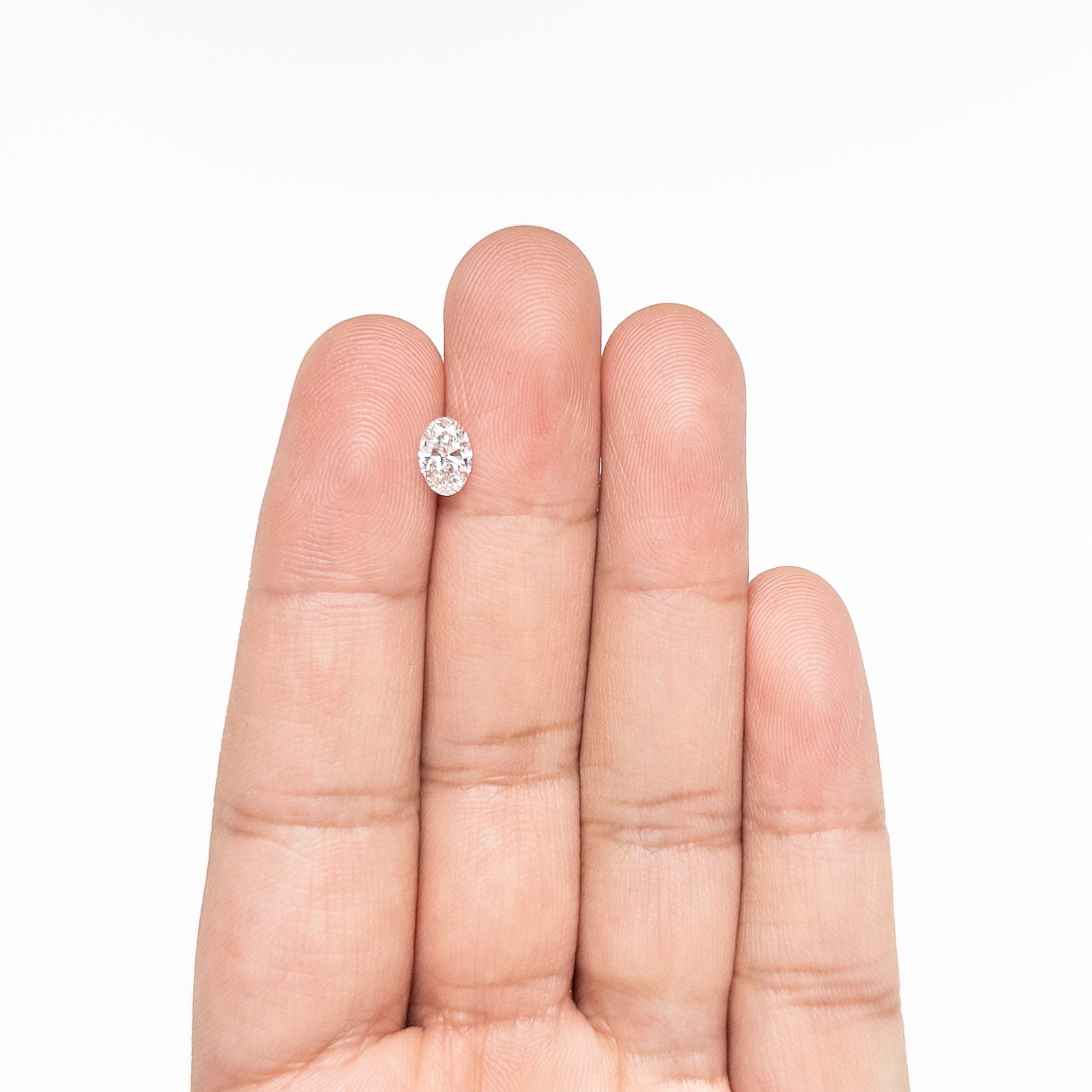 Light Champagne Brilliant Diamond - 0.70ct Oval