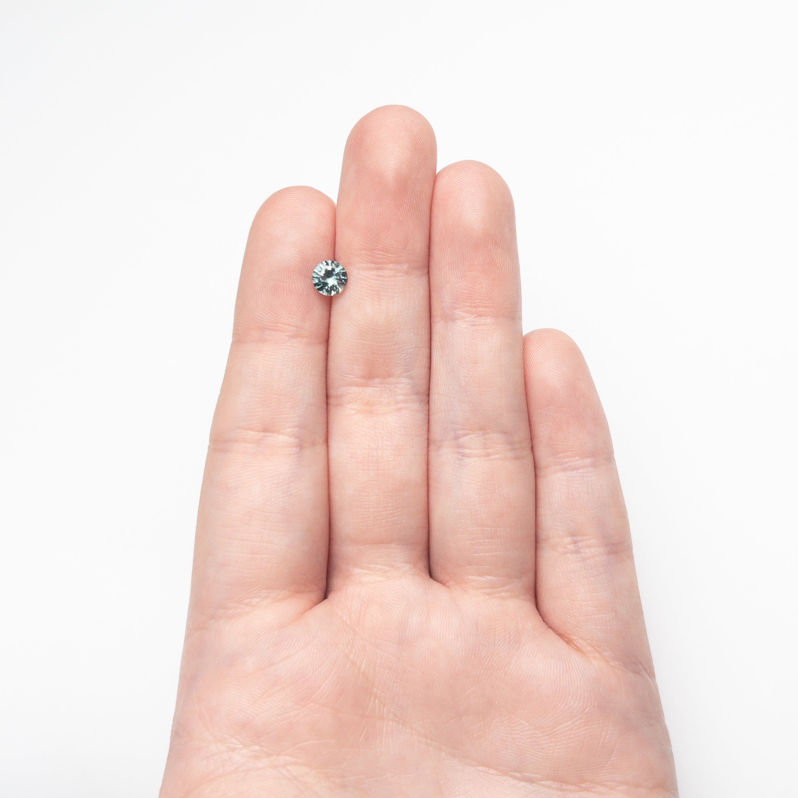Teal/Green Brilliant Sapphire - 0.81ct Round