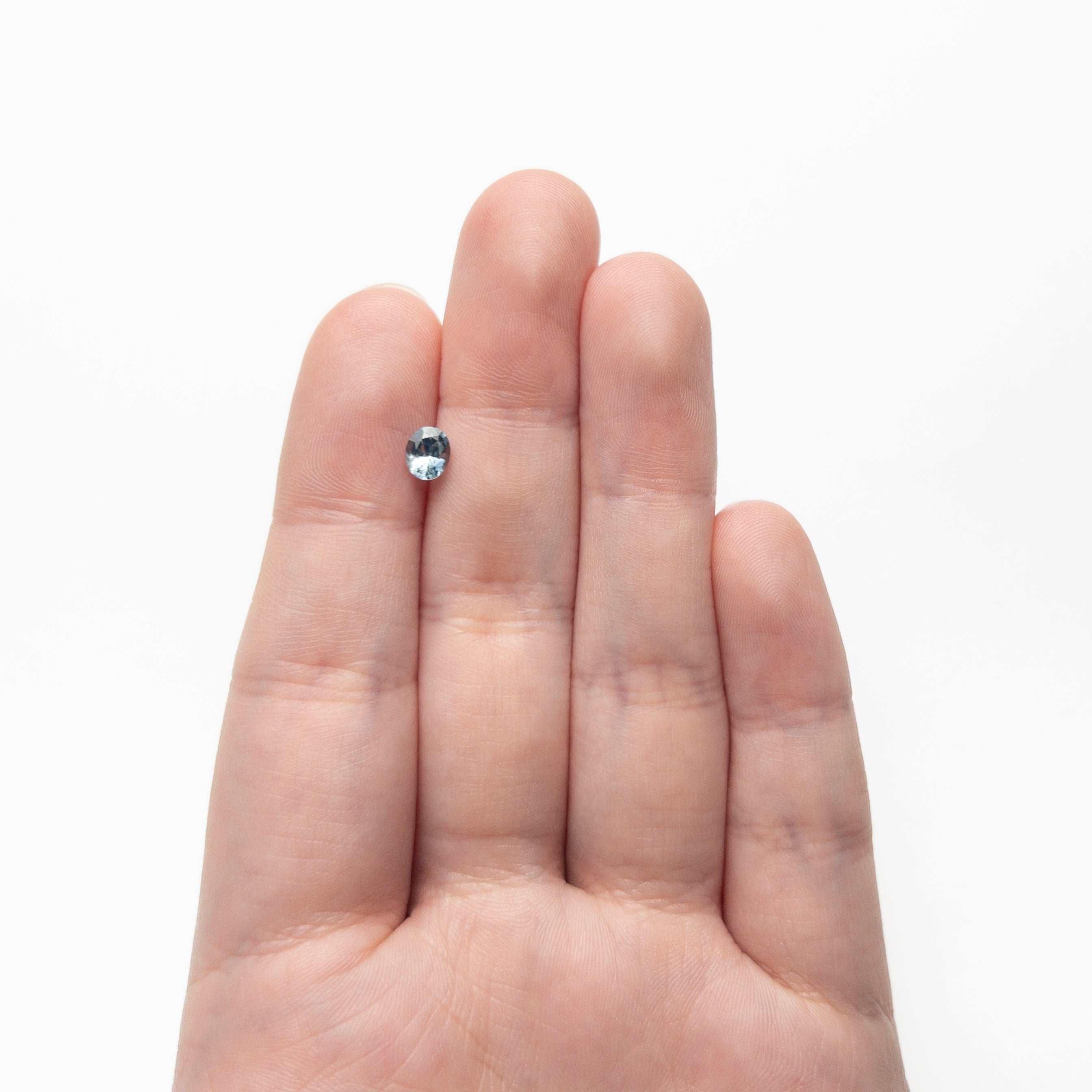 0.63ct 5.51x4.51x3.17mm Oval Brilliant Sapphire 26157-01 - Foe & Dear