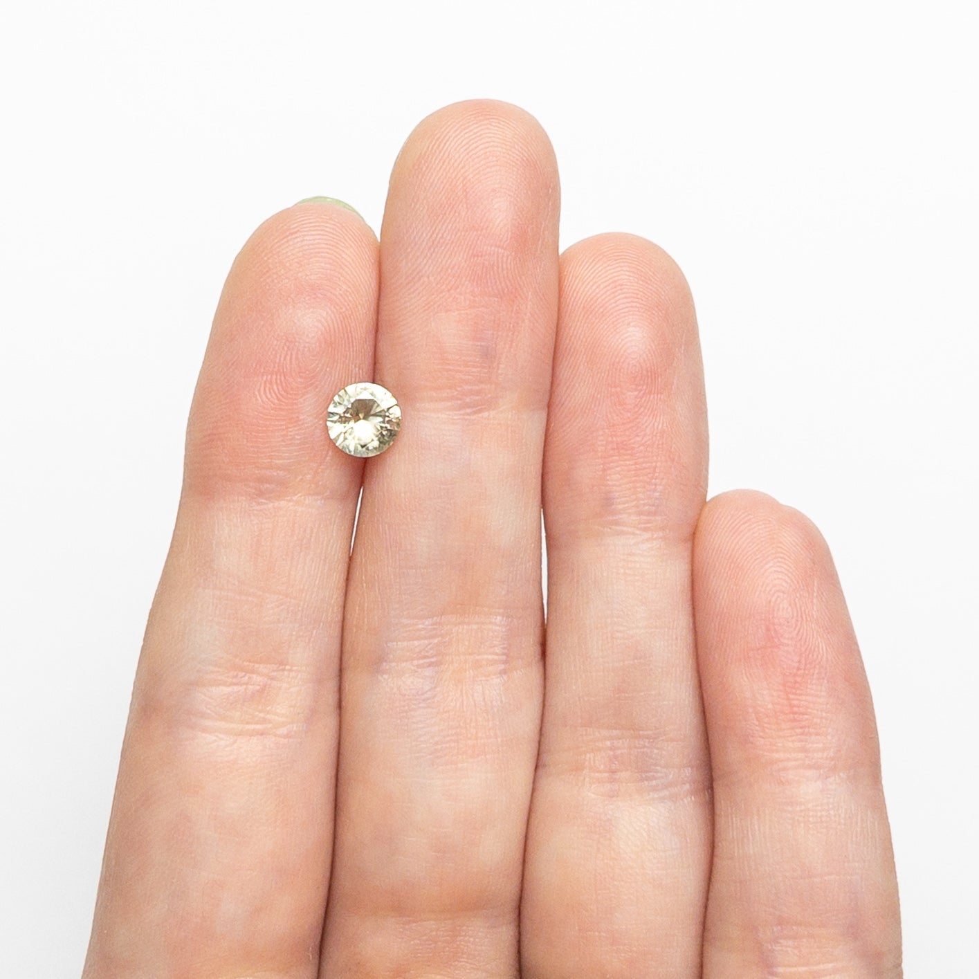 Yellow/Green Brilliant Sapphire - 0.79ct Round