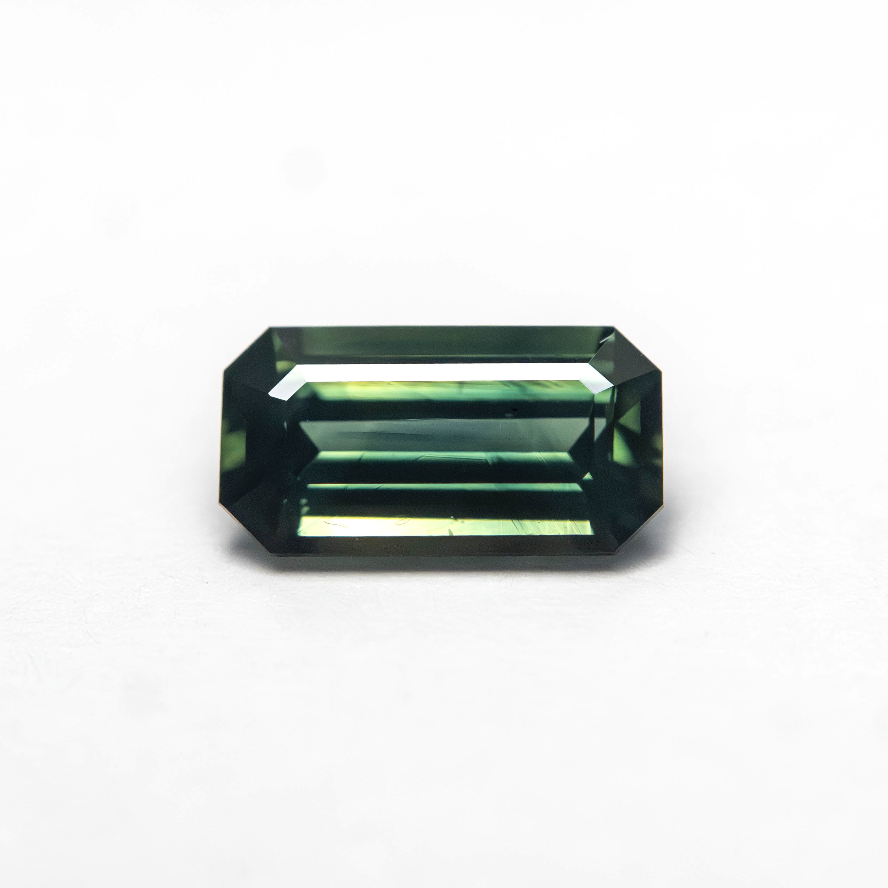 Green/Teal Step Cut Sapphire - 0.99ct Cut Corner Rectangle