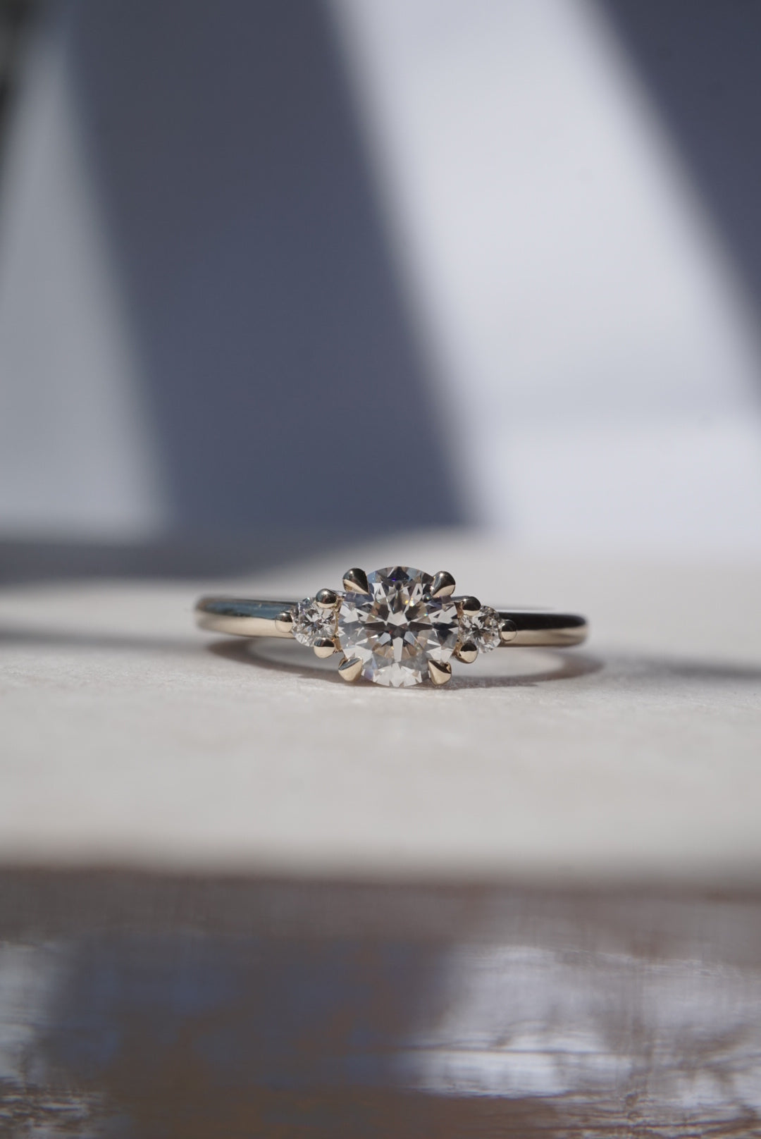 Petite solitaire sales engagement ring